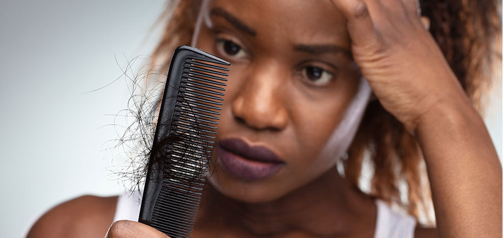 Image of Close up of African Woman Suffering From Hair Loss Problem